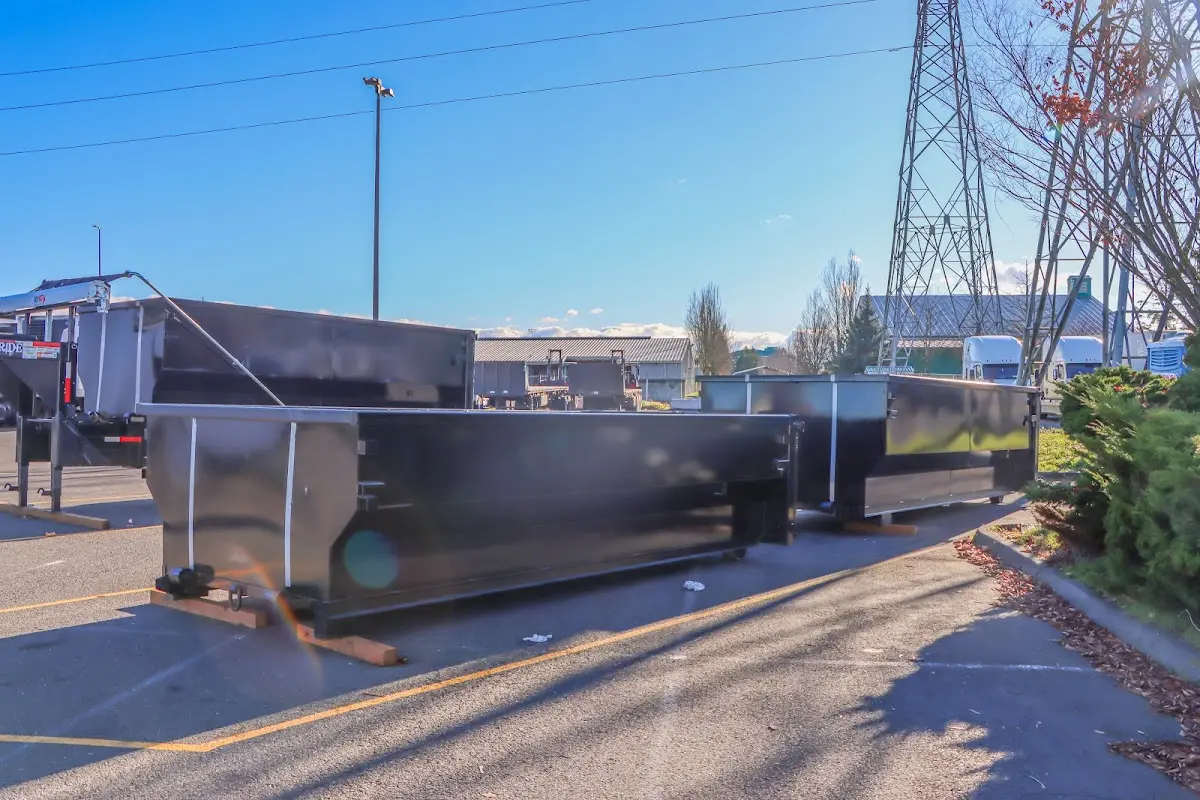 Roll-off dumpster ready for waste disposal at job site for Construction Dumpster Rental in Olivarez